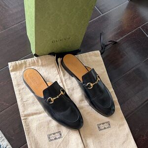 Gucci Black Leather Mules with Gold Hardware